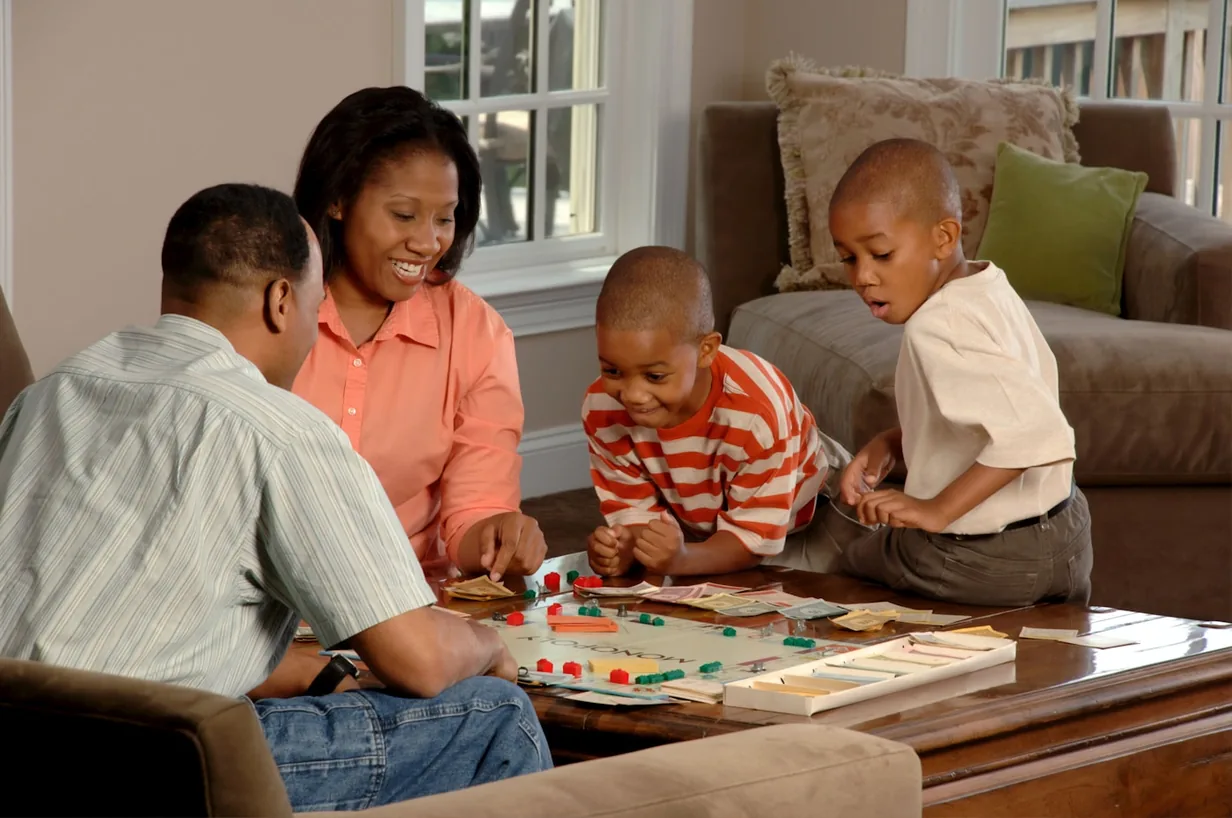 A family playing a board game together